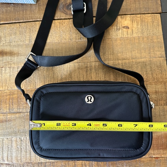 lululemon camera bag black Women's Crossbody 2L Black/Silver – hepsikanadadan so fans can easily transition from daytime activities to game day style. lululemon Leather Alternative Camera Crossbody